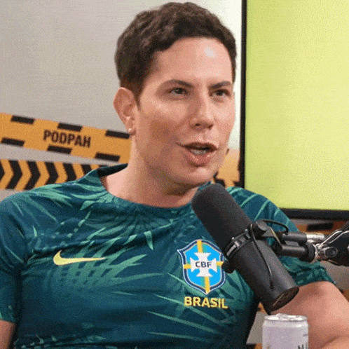 a man is wearing a shirt that says brasil on it