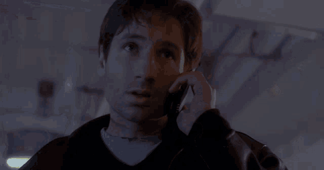 a man talking on a cell phone with the words i 'm fielding all offers and suggestions