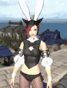 a woman in a bunny costume is standing in front of the ocean