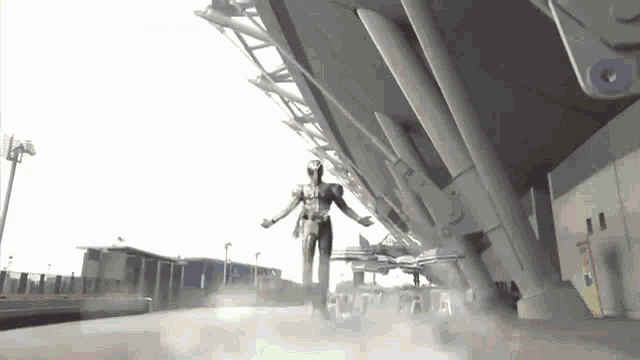 a statue of a man is standing in front of a large building