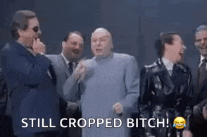 a group of men are standing next to each other and laughing . one of the men is saying `` still cropped bitch ''
