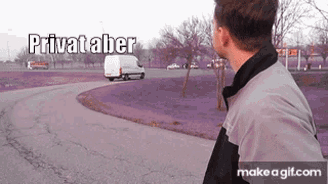 a man is standing in front of a white van that says privat aber on the bottom