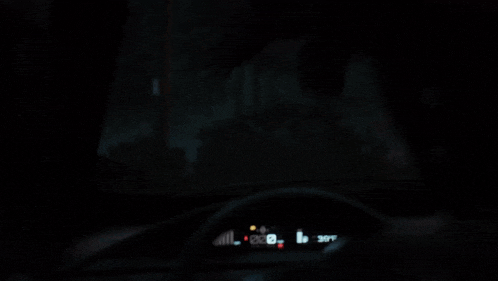 the dashboard of a car shows that the temperature is 39 degrees celsius