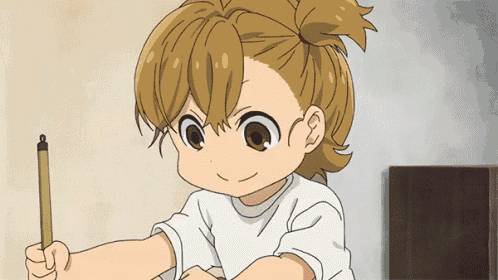 a little girl is holding a pencil in her right hand