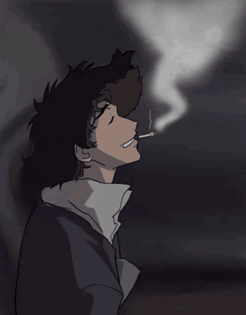 a man is smoking a cigarette in a dark room