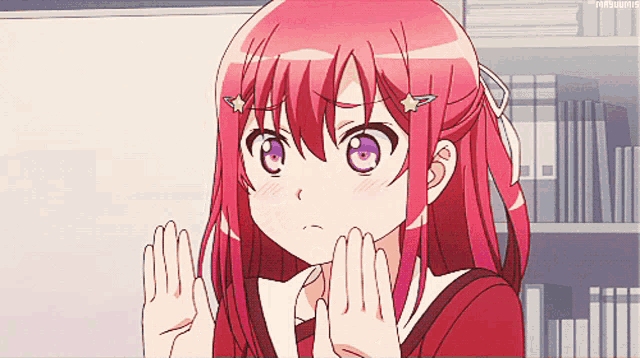 a girl with red hair and purple eyes has a star in her hair