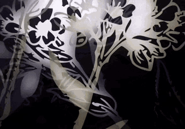 a black background with white flowers and leaves and a silhouette of a person