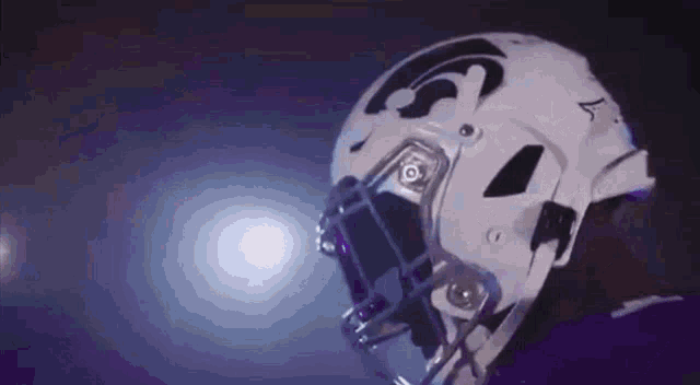 a close up of a football player 's helmet with the letter s on it