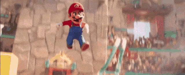 mario is jumping in the air in a video game while a crowd watches .