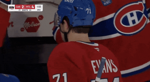 a hockey player with the name person on his jersey