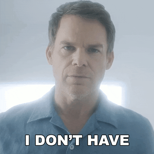 a man in a blue shirt says " i don 't have " in white letters
