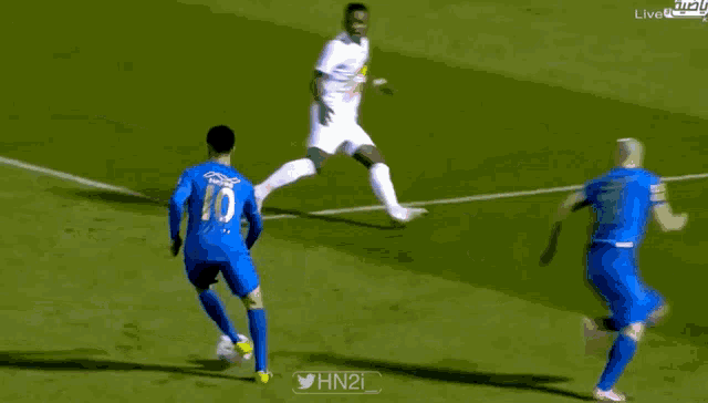 a soccer player wearing a blue jersey with the number 10 on it