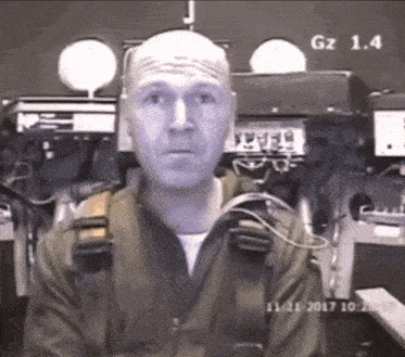 a man in a military uniform with gz 1.4 written on the bottom right