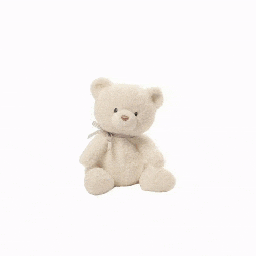 a white stuffed bunny with black eyes and a black x on its mouth