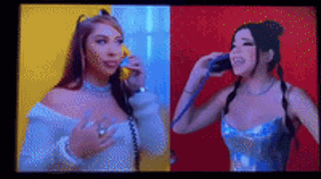 two women are talking on telephones in front of a colorful background .
