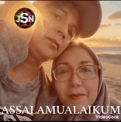 a man and a woman are posing for a picture with the words assalamualaikum videocook below them