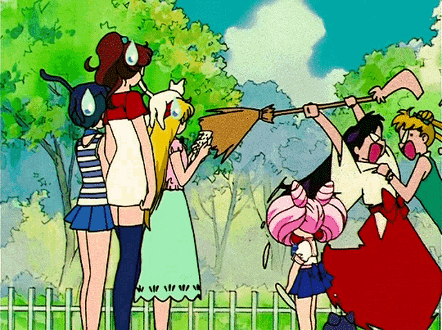 a group of people are standing in a park and one of them is wearing a shirt that says ' aa '