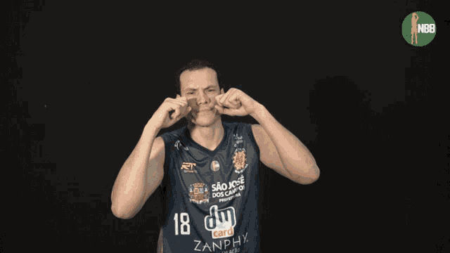 a man wearing a shirt that says dm card on it