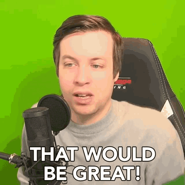 a man sitting in front of a microphone with the words that would be great