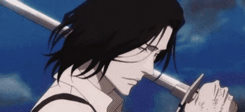 a man with long black hair is holding a sword in his hands .