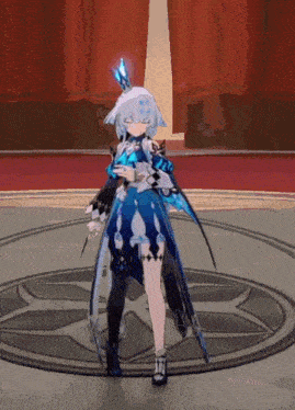 a girl in a blue dress is standing in a circle in a room .