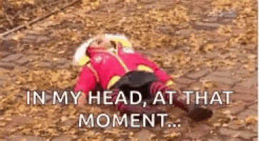 a person is laying on a pile of leaves with the words `` in my head , at that moment ... ''