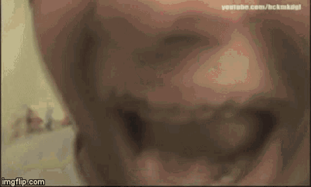 a close up of a person 's mouth with youtube.com / bckmkdfi written at the bottom
