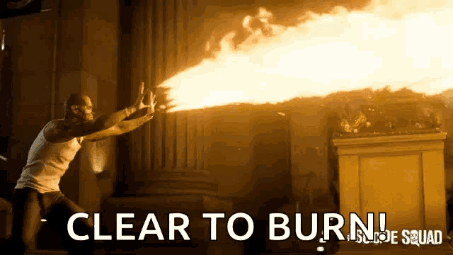 a man is holding a flame coming out of his hand with the words clear to burn above him