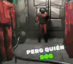 a man in a red suit is standing in a room with the words pero quien written on the bottom