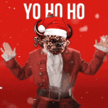 a leopard wearing a santa hat and a santa suit