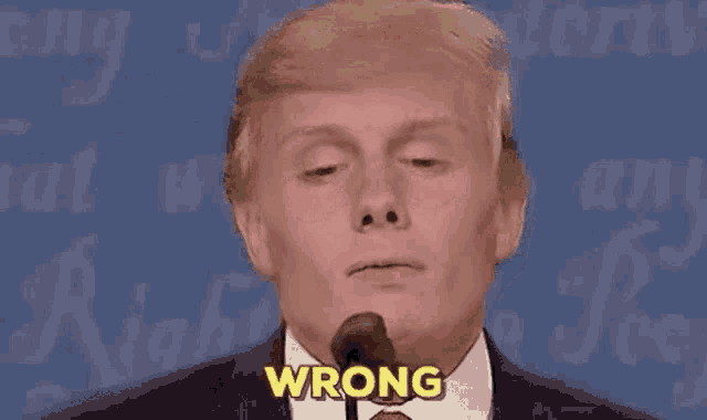 donald trump is giving a speech at a debate and saying wrong .