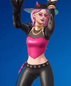 a woman in a pink top and black pants is wearing a devil hat .