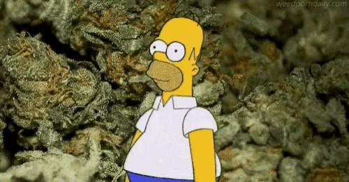 a cartoon character is standing in front of a pile of marijuana .