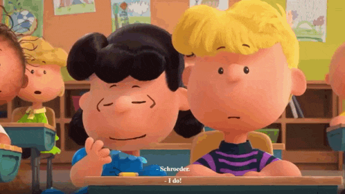 a group of peanuts characters sitting in a classroom