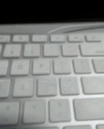 a close up of a keyboard with a few keys missing