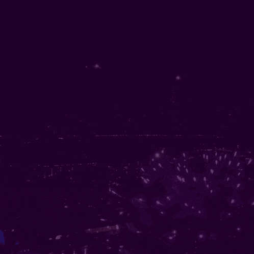 a purple background with fireworks and the word muzikal