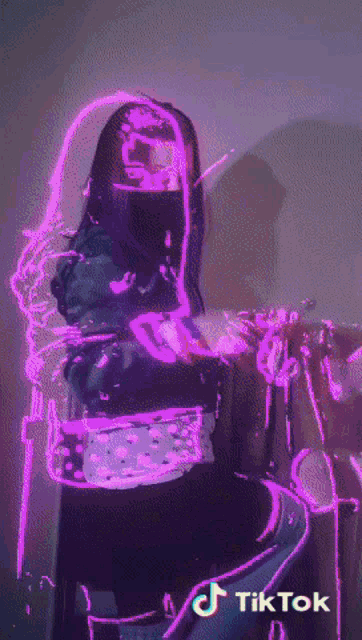 a tiktok video of a woman with glowing pink lines