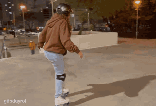 a gif of a person rollerblading with the gifsdayrol written below it