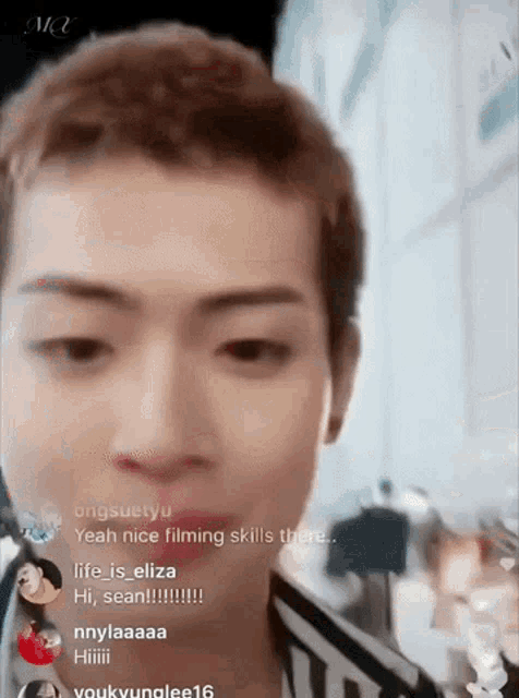 a close up of a person 's face with the words yeah nice filming skills there in the corner