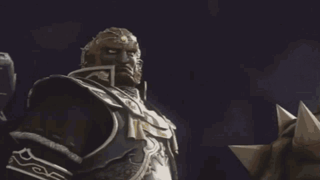 a man with a beard and a crown on his head looks angry