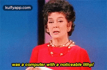 a woman in a red dress says " was a computer with a noticeable lithp "