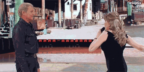 Milly Carlucci Terence Hill GIF - Milly Carlucci Terence Hill Schiaffo GIFs