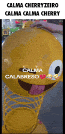 a yellow spring toy with a smiley face on it and the words calma cherryzeiro calma calma cherry