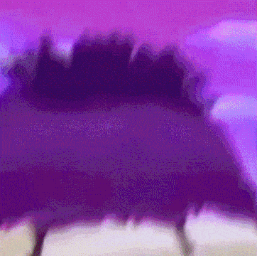 a close up of a purple background with a blurred image of a person 's face .