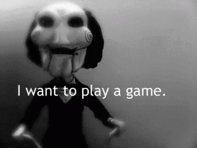 a black and white photo of a puppet with the words " i want to play a game " below it