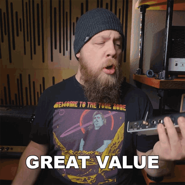a man with a beard is wearing a black shirt that says great value