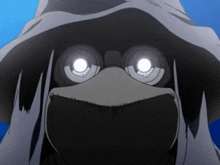a close up of a person wearing a mask and a hat with glowing eyes .