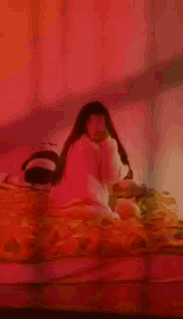 a girl is taking a picture of herself in a mirror with the words only horny written in white on a red background