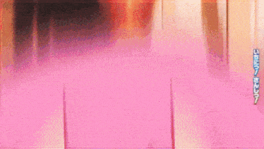 a pink circle with chinese writing on the bottom right