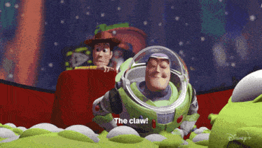 woody and buzz lightyear from toy story are standing next to each other and buzz says the claw